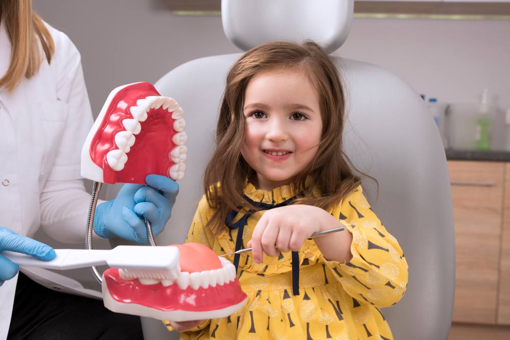 Little girl in a dental office